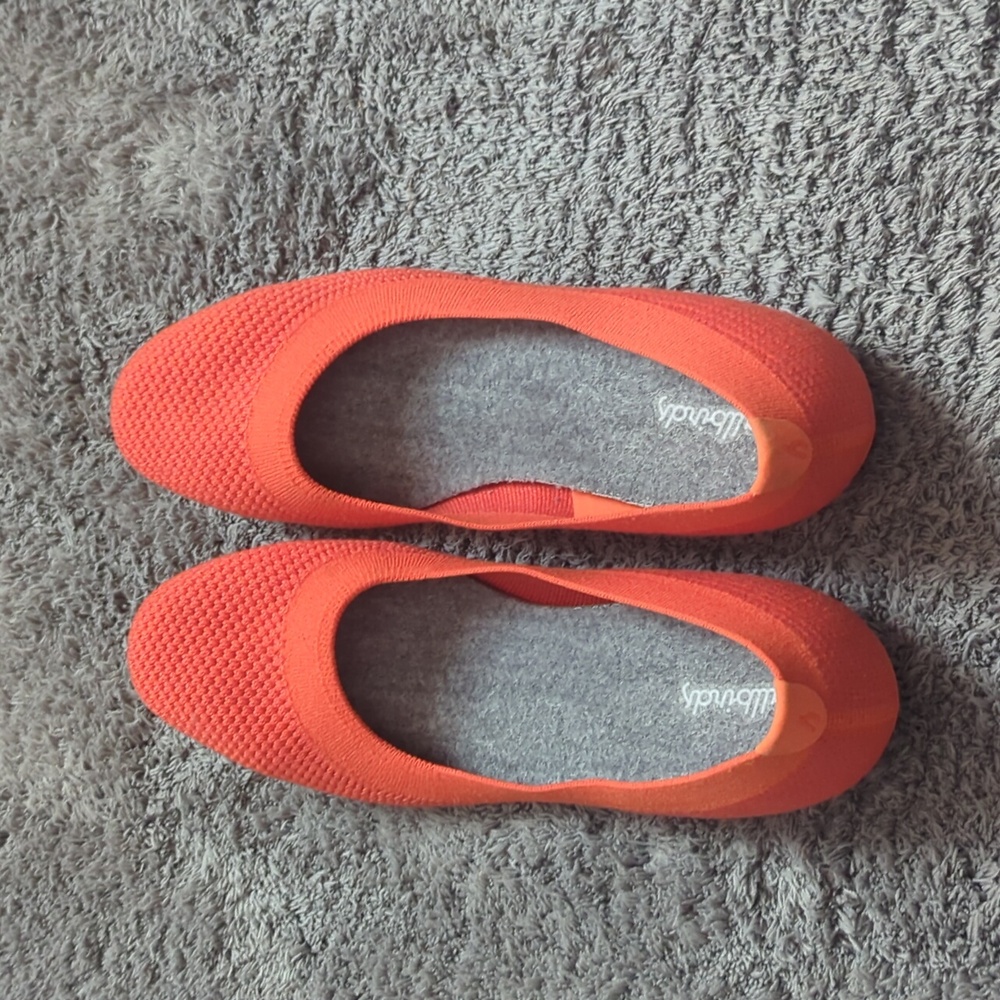 Super cute orange statement allbirds.